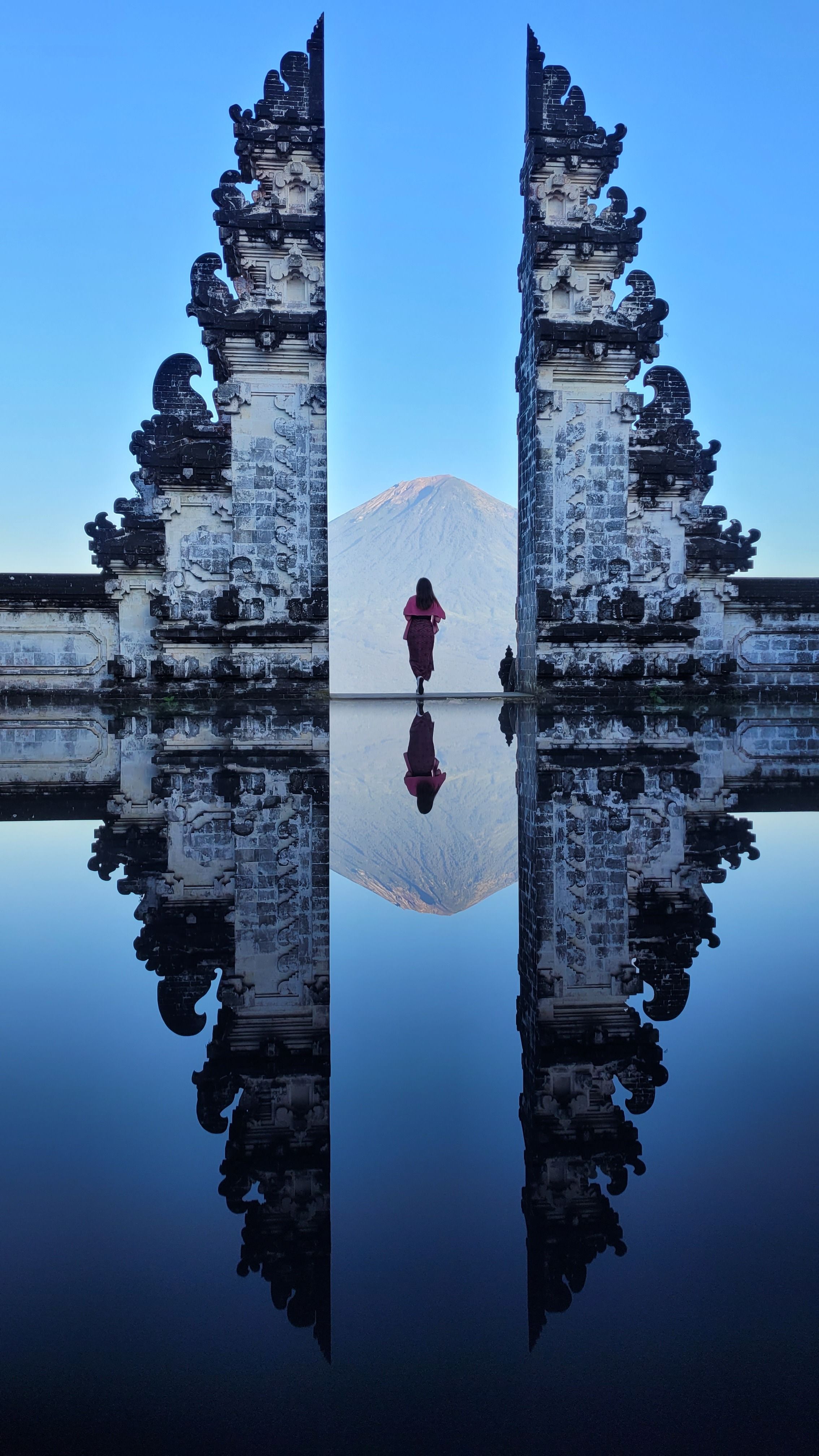 The Gate of Heaven mirrored reflection shot at Pura Lempuyang, Bali